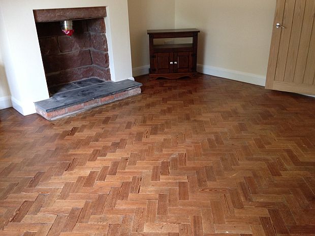 Parquet floor after cleaning with unique, no-sanding, process and sealing